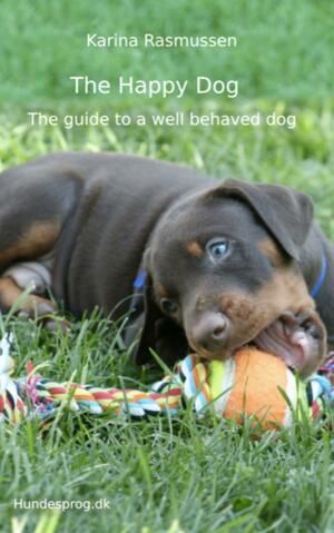 The happy dog : the guide to a well behaved dog