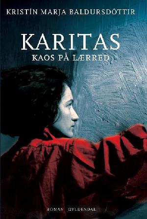 Karitas - kaos på lærred